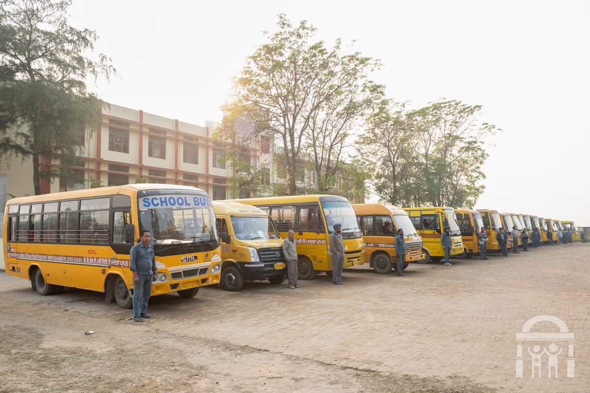 Drivers and school bus vehicle fleet at Guru Nanak Mission Public School in Dhahan Kaleran, SBS Nagar, Punjab, India