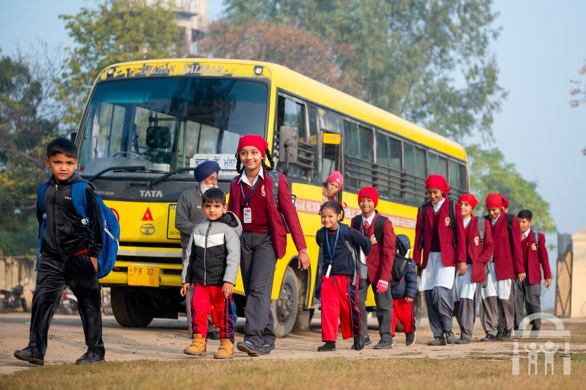 Primary school children walking to class at Guru Nanak Mission Public School in Dhahan Kaleran, SBS Nagar, Punjab, India