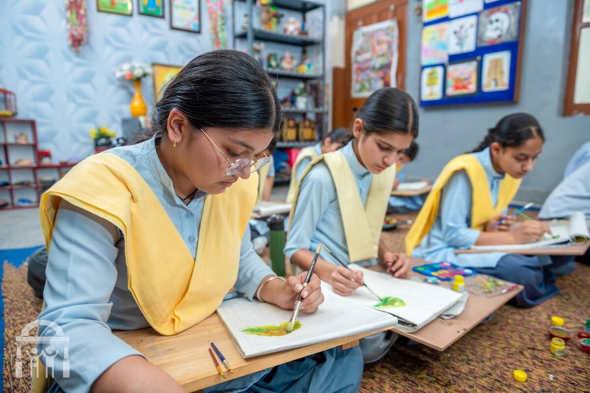 High school students painting in art class at Guru Nanak Mission Public School Dhahan Kaleran